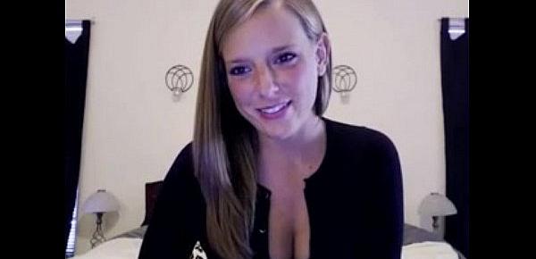  white american girl smiles and shows cleavage at home  -tinycam.org